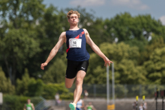 Yves Baur  (LAC TV Unterstrass #18) competes in the long jump of the mens decathlon at 

Schweizer Mehrkampf Meisterschaften in Basel, Switzerland, on Saturday, June 17, 2023.